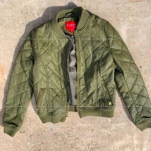 Super cute navy green jacket with a cropped fit.